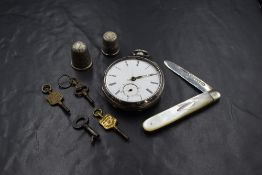 A small selection of HM silver including two thimbles, a silver bladed pocket knife and a
