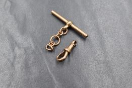 A 9ct gold T-bar with a short chain, along with a 9ct gold dog clip clasp, both marked 375, 5.7g