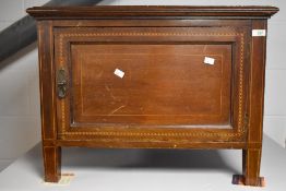 An Edwardian string-inlaid mahogany side cabinet, with rectangular moulded top and inlaid and