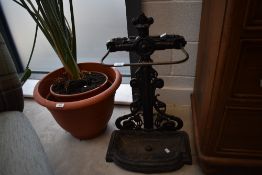 A Victorian cast-iron umbrella/stick stand with brass pole divider 68cm