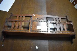 Local interest* Ernest John Oldcorn, an Arts & Crafts oak wall rack, the shaped back over the