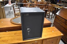 A modern grey painted metal Rhyas Security safe, with two keys, 51cm x 35cm x 33cm