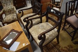A pair of reproduction Regency design mahogany carver armchairs, having moulded top rail and slender