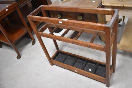 Local interest* Ernest John Oldcorn, an Arts & Crafts oak umbrella/stickstand, of oblong form with