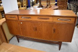 A 1970's G-Plan teak Fresco sideboard, a design by Victor Wilkins, of oblong form with three