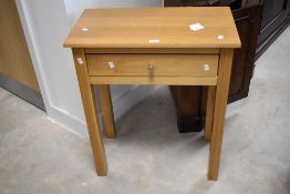 A modern Corndell Nimbus range light oak finish console table, dimensions approx. W66 D35 H79cm