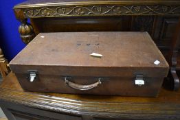 A vintage brown stitched leather Drew & Sons suitecase, of traditional form, initialled M.M.M to