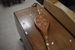 Local interest* Ernest John Oldcorn, a pair of fine Arts & Crafts oak long handled bellows, of