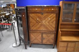 A French 19th century marble topped walnut escritoire/secretaire a abbant, the moulded rectangular