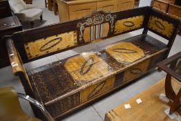A 19th/20th century scumble decorated pine box settle, of large proportions, the back having a