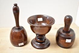Three presumed 19th-century wooden treen pestle and mortar; sold with a heavier pestle, all
