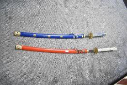 Two 20th-century reproduction decorative Japanese-style swords, unmarked, (2), condition is
