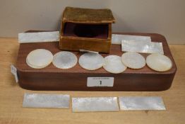 A small quantity of late 19th-century Chinese canton carved mother-of-pearl gaming counters,