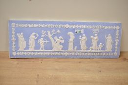A late 19th-century Wedgwood Jasperware plaque, showcasing a classical Greek mythological scene in