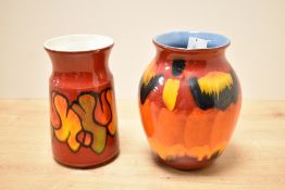 Two 20th-century Poole Pottery vases, to include a Volcano example and a Delphis example, both