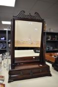 A fine presumed early 19th-century George III-style mahogany dressing table mirror, featuring a