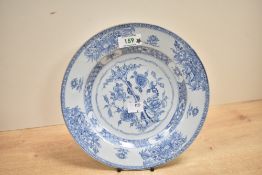 A 19th century Chinese export porcelain plate, of dished circular form, hand decorated with