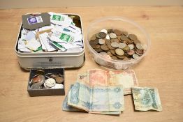 A quantity of 20th-century worldwide stamps, coins and additional bank notes, (1 tin of stamps and 1