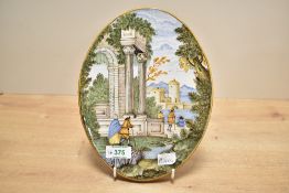 A mid 18th-century majolica style oval plaque, possibly Castelli by Nicola Cappelletti,depicting a