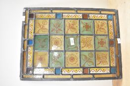 Thought to be a 19th-century ecclesiastical-style stained glass window, featuring brightly