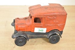 A early 20th-century cast iron Brooke Bond Tea (started 1869) delivery truck money bank, having a