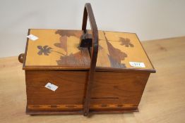 A 20th-century Sorrento ware marquetry sewing box, decorated with a coastal landscape to the two top