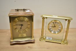 Two late 20th-century to contemporary brass mantel clocks of quartz movements, to include a
