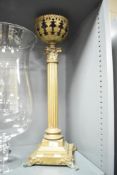 A 19th-century brass Neoclassical-style Corinthian column candle stick/lamp base, featuring fluted