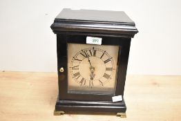 A late 19th-century single fusee ebonised library clock, having an anchor escapement, a brass