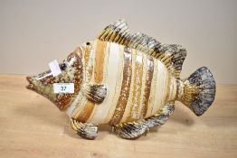 A mid 20th-century French majolica fish wall sculpture, featuring a modernist fish shape with a