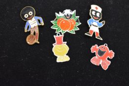 Three 20th-century Robinsons Jam enamel badges; sold with two Roger Hargreaves metal and enamel