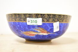 A 20th-century Carlton Ware lustre bowl, featuring a pair of hummingbirds in flight against an
