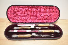 A fine Victorian antler-handled silver-plated meat and game carving set, comprising two knives and