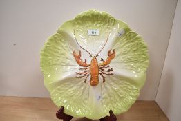 A large early 20th-century Carlton majolica ware lobster and cabbage leaf platter, featuring a