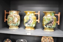 Three large presumed 19th-century Thomas Forester-style majolica pitchers, featuring molded bird