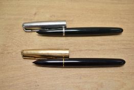 Two Parker 51 aerometric fill fountain pens in Black, one with Rolled Gold parallel lined cap (