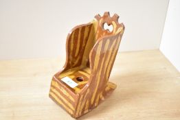 Thought to be 19th-century English Folk Art-style pottery slipware 'lambing chair', of slab-