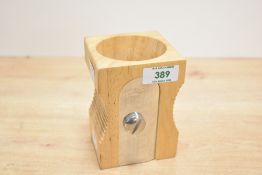 A contemporary Suck and Company rubber wood and stainless steel 'Double Sharpener Desk Tidy', marked