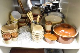 A large quantity of late 20th-century stoneware pottery, of soft yellows and neutral colouring, to