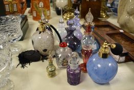 A quantity of 20th-century glass perfume bottles/atomisers, to include a selection of Caithness