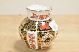 A small 20th-century Royal Crown Derby Bone China 'Old Imari' bud vase, of baluster form,
