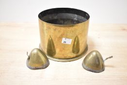 An early 20th-century German brass Howitzer shell from Mamete wood (Somme) having been used in the