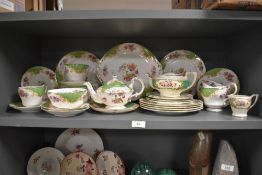 A quantity of 20th-century Paragon bone china 'Rockingham' tableware, featuring delicate Oriental