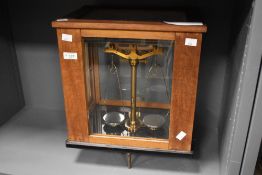 A 20th century analytical balance instrument, w37cm