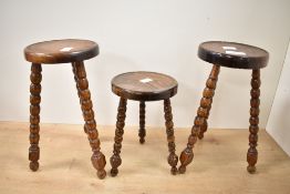 Three miniature 20th-century French-style tripod stools, possible apprentice pieces, featuring