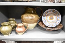 A quantity of 20th-century studio pottery; to include a large decorative charger with floral and