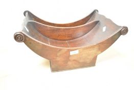 Thought to be a Georgian mahogany double cheese coaster, featuring a slatted bateau design with