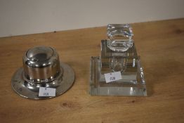 Two early 20th-century inkwells, to feature a chromed domed example with a circular base and a glass