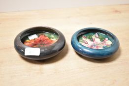 Two 20th-century Moorcroft Pottery bowls, to include tube-lined Hibiscus and Tiger Lily examples,