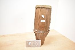 An early 20th-century Nigerian membranophone-single-headed wooden drum with presumed animal skin